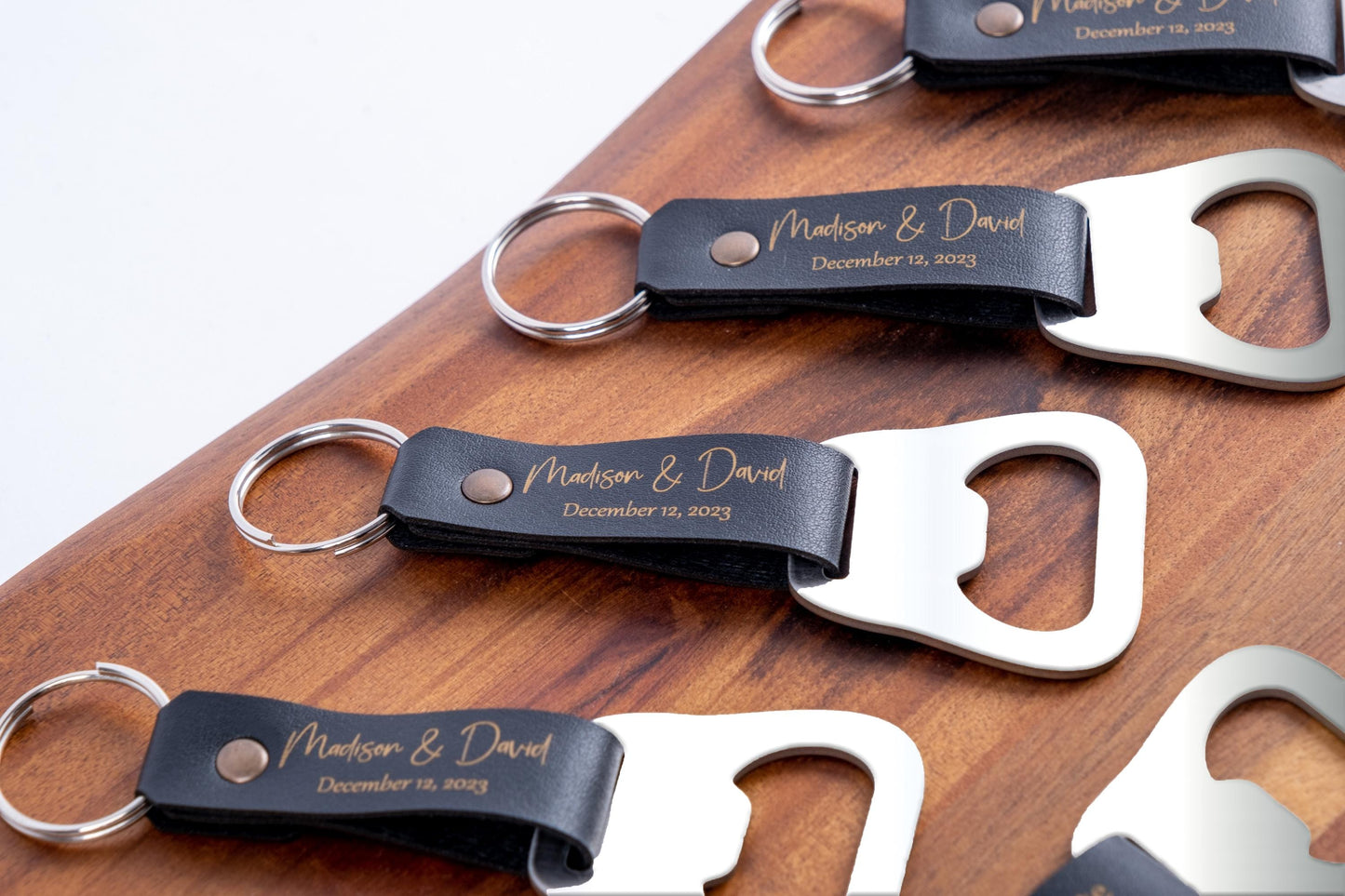 Leather keychain bottle opener bulk wedding favors – front view
